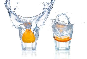 cocktail in a martini glass on a white background with fruit