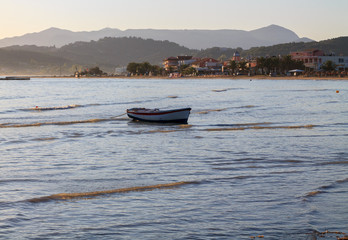 Boats  in the beautiful blue water off the Corfu coast