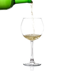 WHITE wine swirling in a goblet wine glass, isolated on a white background