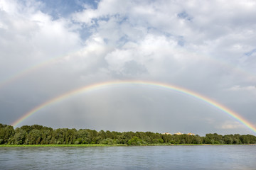 Fototapeta na wymiar Rainbow over Vistula river in Warsaw