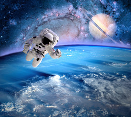 Fototapeta na wymiar Astronaut Spaceman Planet Saturn