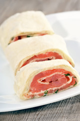 Salmon lavash rolls with cheese and dill