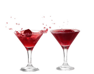 Wine collection - Splashing red wine in a glass. Isolated on whi