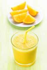 Orange smoothie in glass
