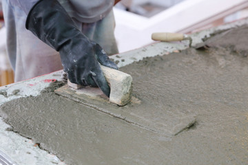 hand using trowel