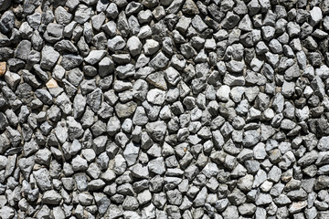Stone wall in detail as background