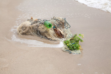 Tangled fishing nets on the beach