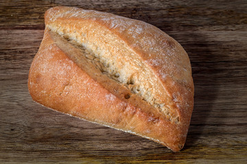 bread isolated on wooden table 