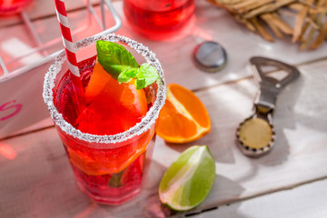 Cold summer drink with citrus fruit