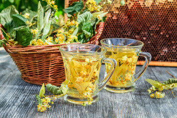 Summer lime tea with honey served in the garden