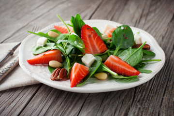 Spring salad with spinach leaves