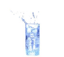 Glass of water, ice and slice of fresh lemon on a white background