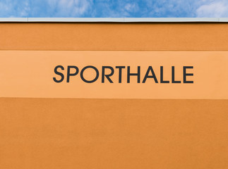 Sporthalle Wand Raufaser Rauputz Hintergrund orange 