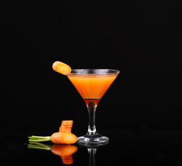 Carrots and juice in a glass