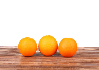 oranges on a wooden board