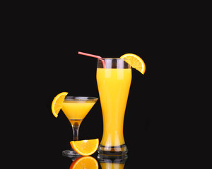fresh organic orange juice and vodka in a tall glass  