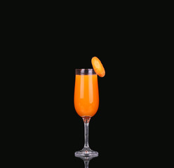 Carrots and juice in a glass