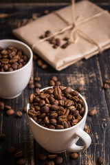 Fototapeta premium Coffee beans in a cups