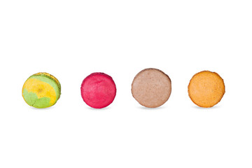 Close up colorful macaroons isolated on white background.