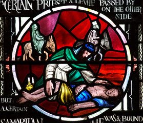 The Good Samaritan in stained glass - obrazy, fototapety, plakaty