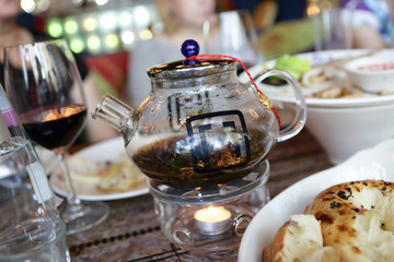 Glass teapot in the restaurant