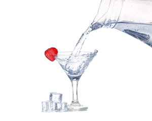 Strawberries, ice cubes into the glass