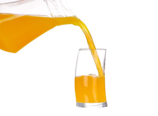 pouring Orange juice and slices of orange 