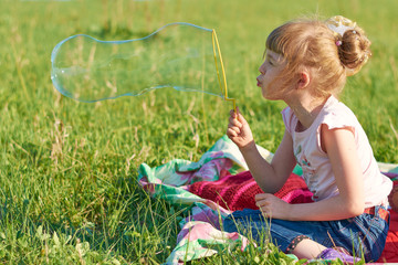 Girl blow bubbles