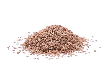 Pile of Caraway Seeds Isolated on White Background