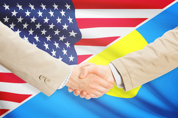 Businessmen handshake - United States and Palau