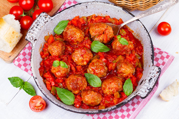 Meatballs with tomato sauce in a pan