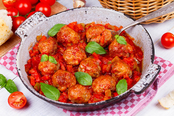 Meatballs with tomato sauce in a pan