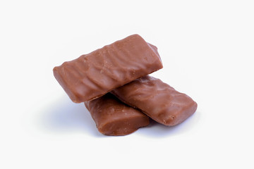 Chocolate candies on a white background.