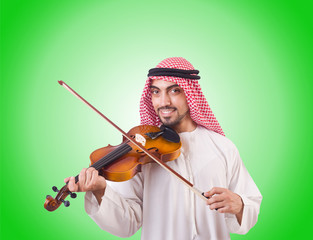 Arab man playing music on white