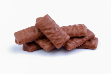 Chocolate candies on a white background.