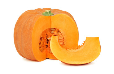 Half of ripe pumpkin with one slice (isolated)