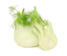 One whole and a half ripe fennels (isolated) © ArtemSam