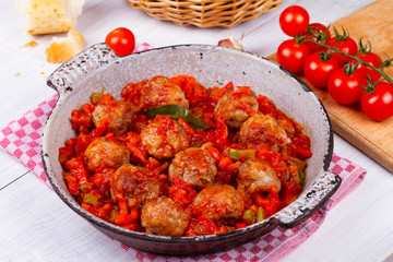 Meatballs with tomato sauce in a pan