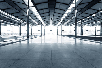 Empty floor of train station platform