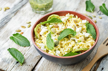 zucchini, millet, mint, pumpkin seeds, goat cheese salad with co