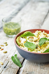 zucchini, millet, mint, pumpkin seeds, goat cheese salad with co