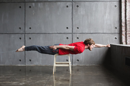 Man in superhero pose