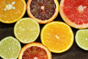 Fresh slices of different types of citrus