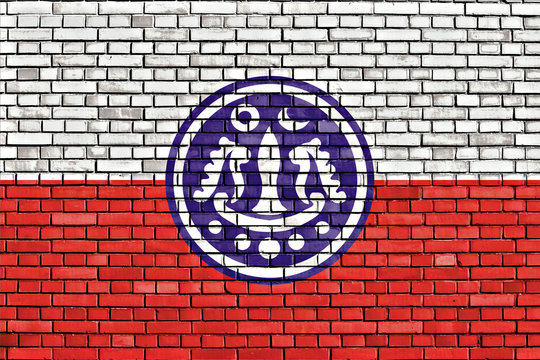 flag of Rakhine painted on brick wall