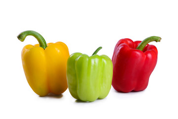 Three multi-colored pepper