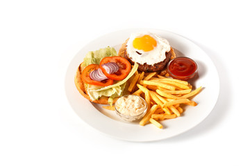 Breakfast with roasted potato, egg, sauce, meat