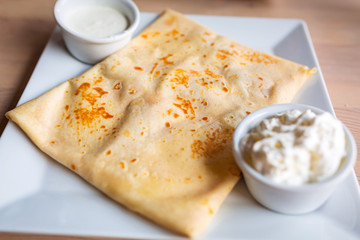 Delicious mascarpone cheese pancake with whipped cream