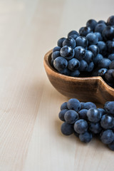 Grapes in a heart shape wooden plate