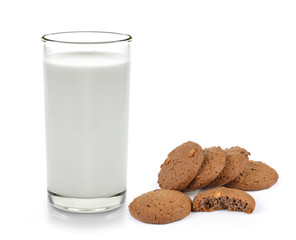 cookies and milk on a white wooden background