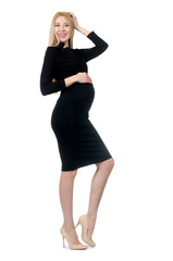 Fototapeta premium Pretty pregnant woman in black dress isolated on white